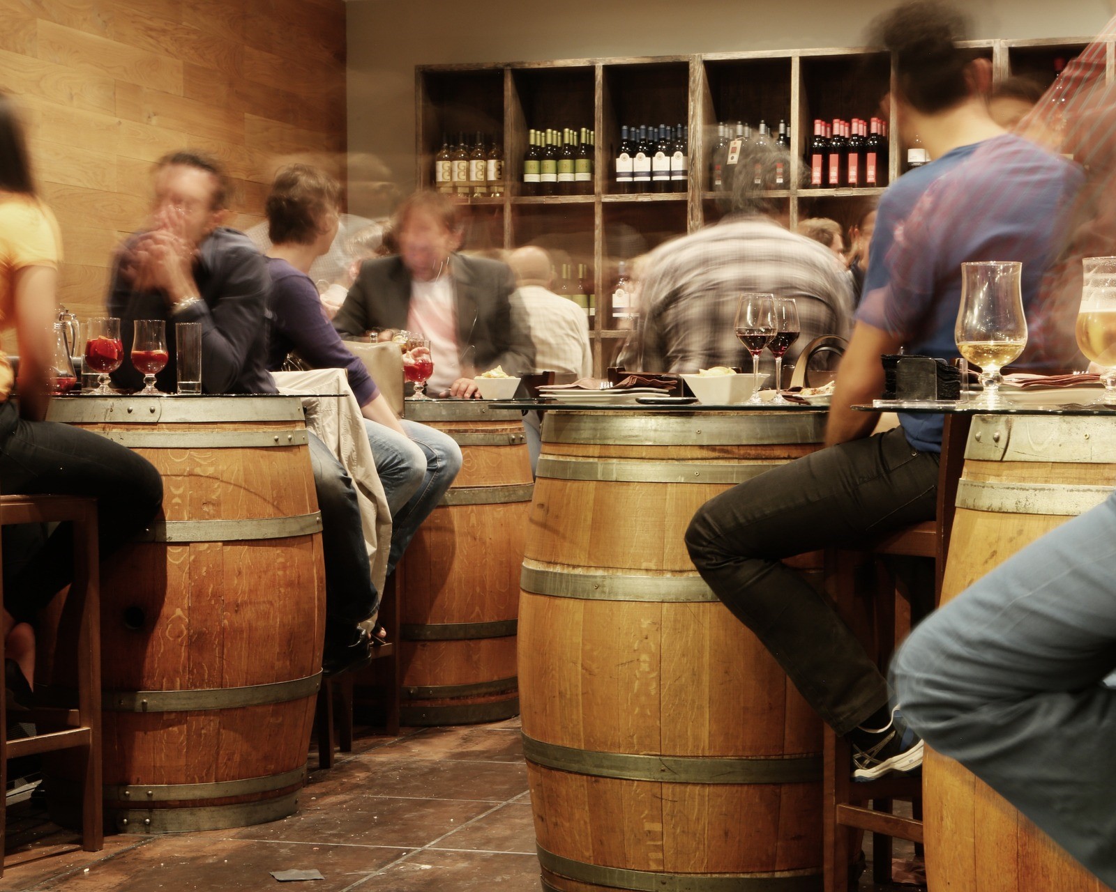People enjoying wine in the Tasting Room