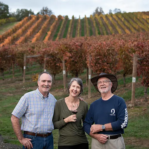 Greg and Hilda standing in front of the Abacela Vineyard thumbnail